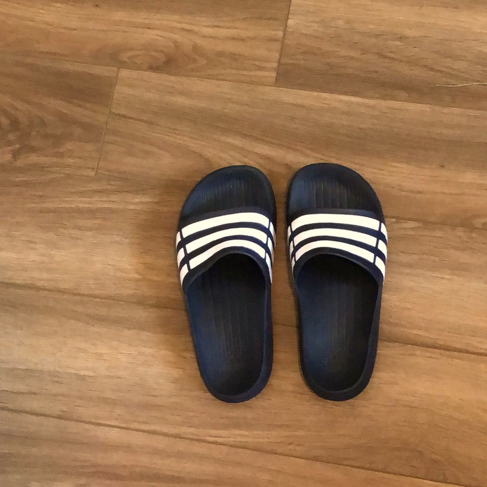 Black and white striped slides.